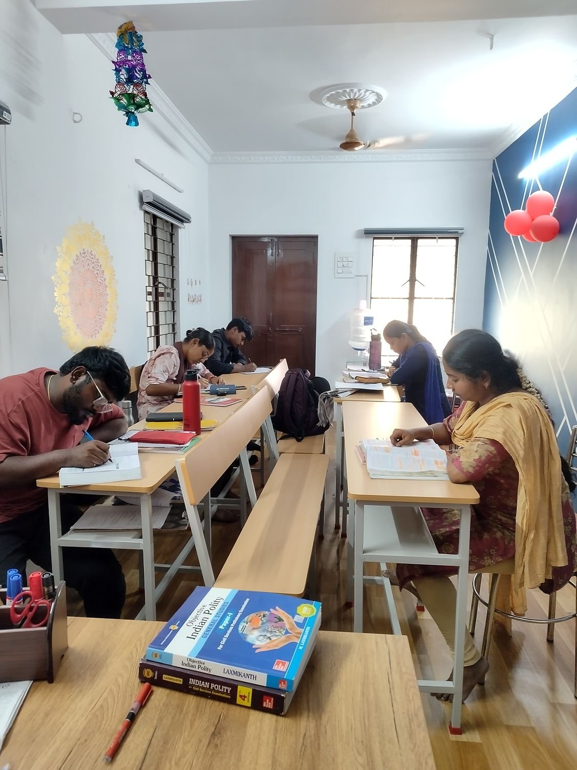 Aspirants at the Adhira IAS Academy study hall in Pollachi
